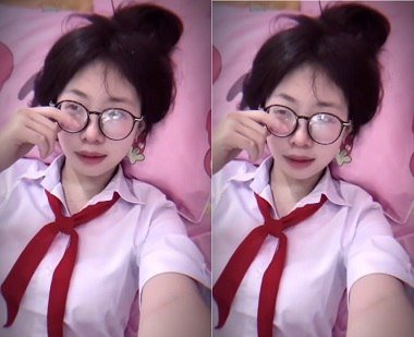 Chịch em đang đeo khăn quàng đỏ